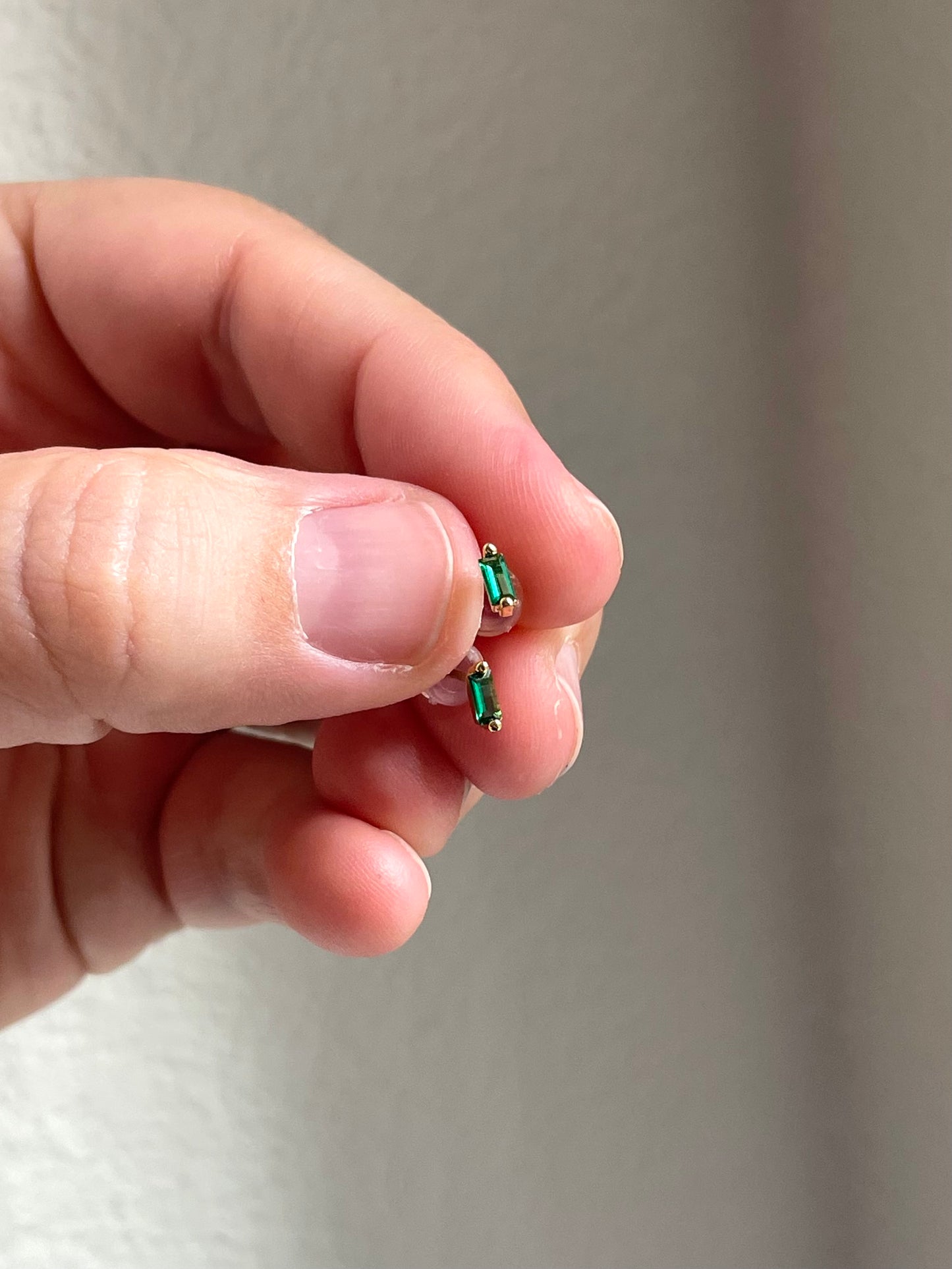 Tiny emerald studs